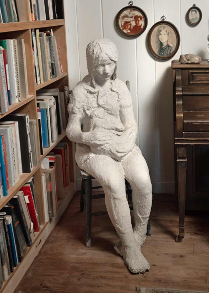 Girl Holding Cat is a 1968 plaster and wood sculpture by George Segal. The work is part of the Zimmerli's exhibit courtesy of Rena Segal.