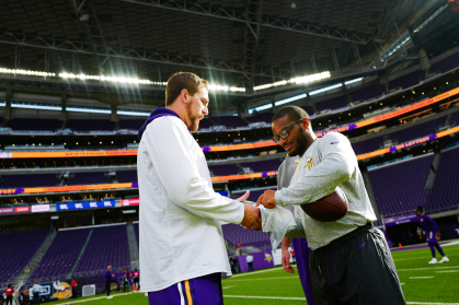 Terrell Barnes with wide receiver Adam Thielen