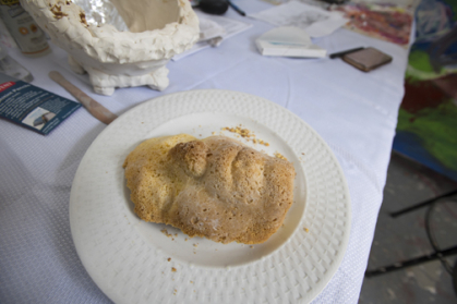 Bread molded into the shape body parts - in this case a face - are featured in Alessandra Puglisi's senior thesis sculpture project "Offerings."