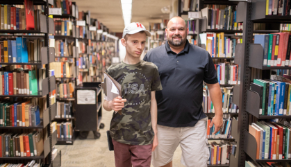 A SCALE participant with his job coach. 