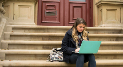 girl using laptop