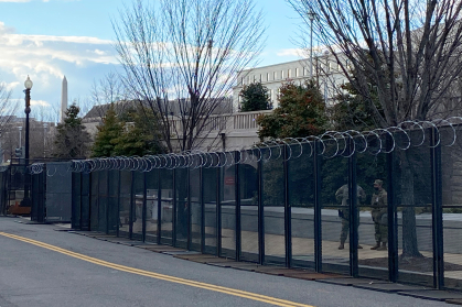 Fence with razor wire