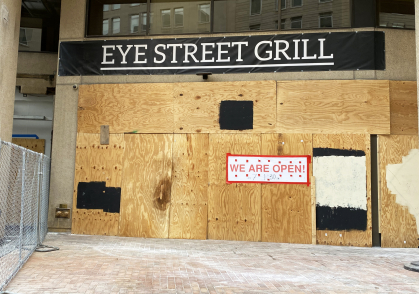 Boarded up Eye Street Grill open for business