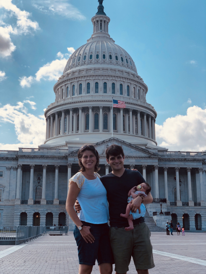 Devinn Lambert with her husband and child in front of the Capitol building in Washington, D.C.