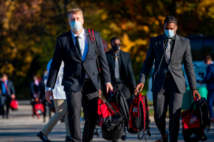 Scarlet Knights football players following strict COVID-19 protocols when traveling