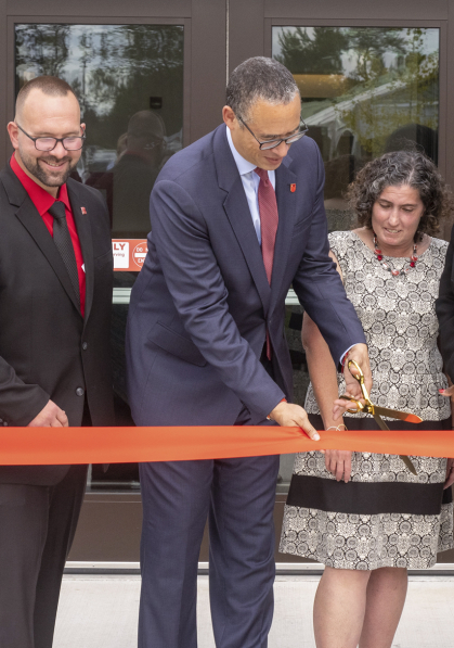 Christopher Manente with Rutgers president Jonathan Holloway and Dina Karmazin Elkins