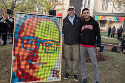 The president admires his image made out of Rubik’s Cubes, created by senior Dylan Sadiq.