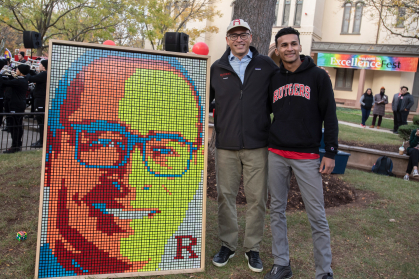 The president admires his image made out of Rubik’s Cubes, created by senior Dylan Sadiq.