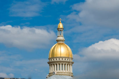 New Jersey Capital dome with blue sky and white clouds