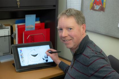 Mike Lucas drawing on a screen
