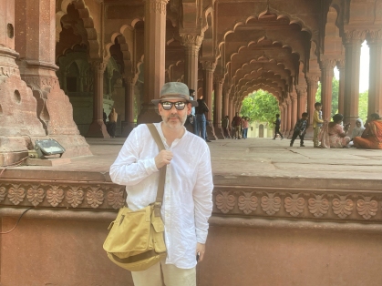 Alastair Bellany in front of a temple in India