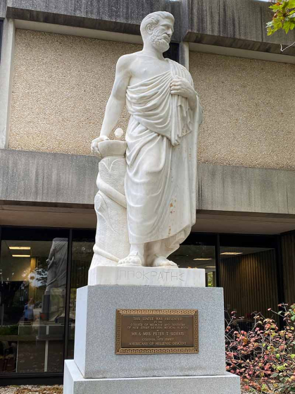"Hippocrates" is near the entrance of the Research Tower and the Daniel I. Kessler Teaching Laboratories on Busch campus at Rutgers-New Brunswick.