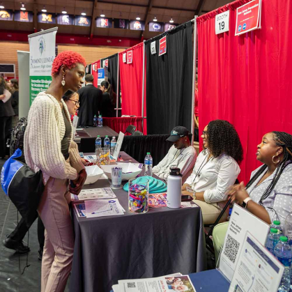 A Rutgers student speaks with a recruiter during last year’s Fall Career and Internship Mega Fair.