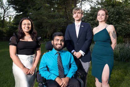 Rachael Carrion, Sohaib Hassan, Sean Zujkowski and Stella Campbell pose together for a photograph as Rutgers University students and their families gather for The Matthew Leydt Society