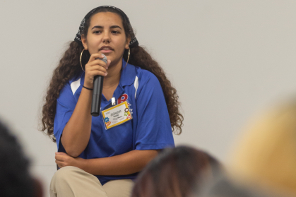 Amanda Pinho speaking at the inclusion summit