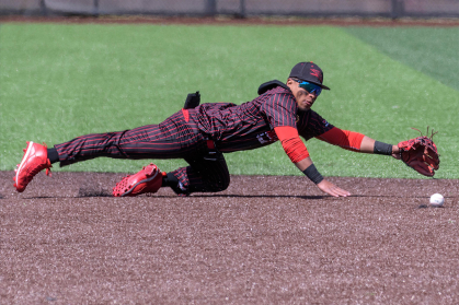 Baseball player catching ball 