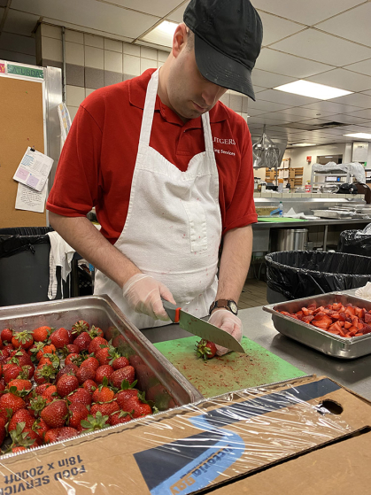Chris cutting strawberries 