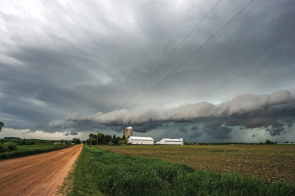 Farm house with stormy clouds