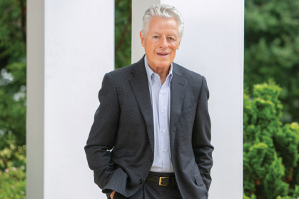 James J. Florio standing in front of two columns