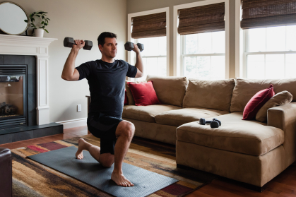 Man exercising indoors