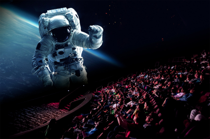 Astronaut on the movie screen at the Jennifer Chalsty Planetarium 