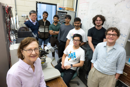 Physicist Eva Andrei with some of the postdocs, graduate and undergraduate students who are members of her research group