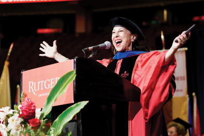 Maria Hinojosa addresses graduates at the Prudential Center in Newark. 