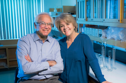 Martin J. Blaser and Maria Gloria Dominguez-Bello in lab