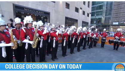 Members of the Rutgers Marching Scarlet Knights line up in front of Rockefeller Center.