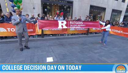Today news anchor Craig Melvin stands with Rutgers banner with student Lola Adeleye holding the other side.