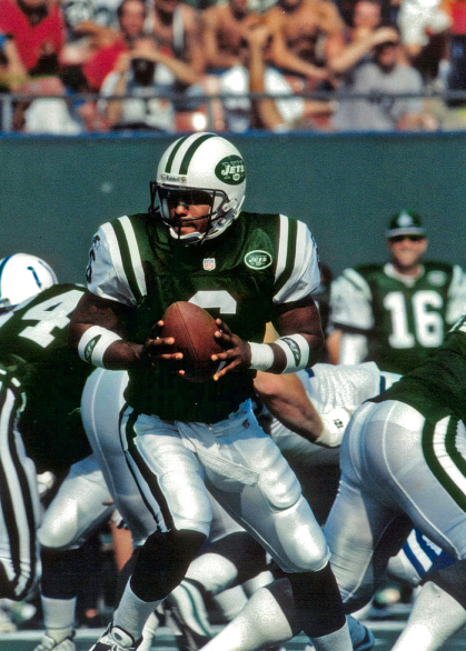Former quarterback Ray Lucas is shown on the field holding a ball during a New York Jets game