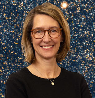 Women in a black top with a background of stars and deep blue sky.