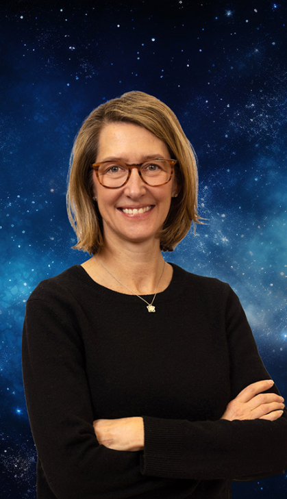 woman wearing black shirt with blue starfield in background