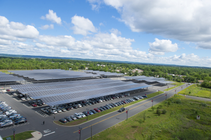 Solar panels in a parking lot on Livingston campus