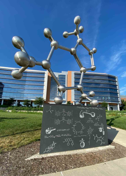 "The PhD Molecule" is in front of the Chemistry and Chemical Biology Building on Busch campus at Rutgers New-Brunswick.