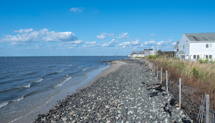 A berm of rocks facing the Delaware Bay