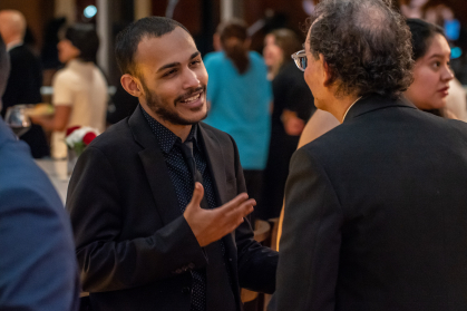 CLAC director Carlos Fernandez and Aziel Rosado, one of the beneficiaries of the student excellence grant