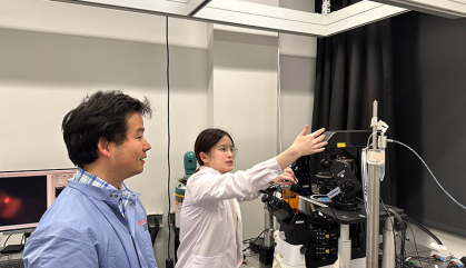 Man and woman work in a science laboratory