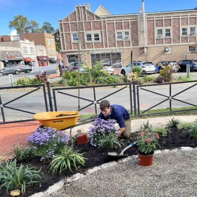 Rutgers student Josh Kover volunteered his time in 2023 planting for a project at Baker Square, a community gathering space in Maplewood, N.J.