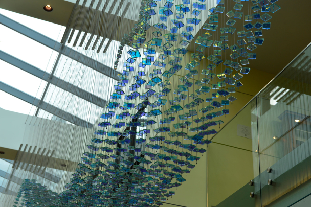 "Biowaves" glass sculpture created by Ray King inside the School of Pharmacy