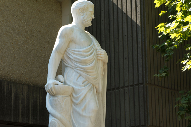 Sculpture of Hippocrates outside the Robert Wood Johnson Medical School on Busch campus