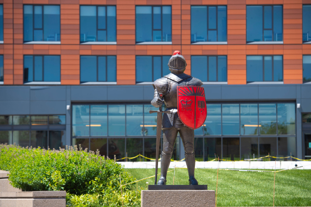 Scarlet Knight statue stands at the entrance to The Yard on College Avenue