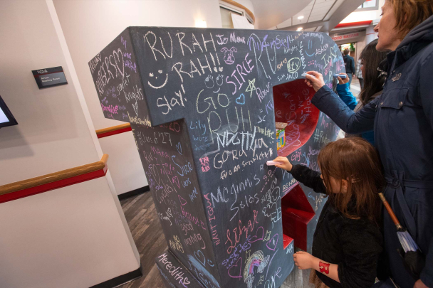 Visitors decorate Block R on Rutgers Day