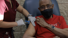 Robert Johnson, dean of Rutgers New Jersey Medical School and interim dean of Rutgrs Robert Wood Johnson Medical School, receives the COVID-19 vaccine.