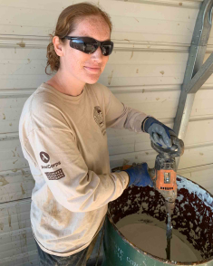 Johanna Cordasco mixes glue in a barrel at Bent’s Old Fort in southeastern Colorado.