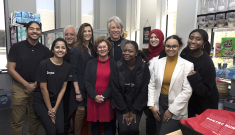 Jon Bon Jovi and his wife Dorothea pose with Rutgers-Newark Chancellor Nancy Cantor and the staff of pantryRUN, the campus food pantry.